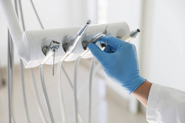 Professional Tooth Extraction technician working in Montgomery County County, IL